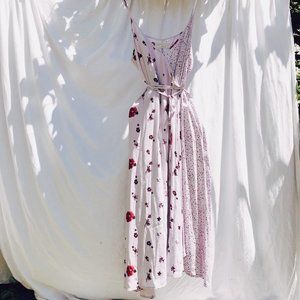 Lilac crossover summer dress with floral pattern.